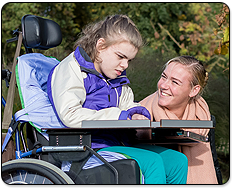 Woman Caring for Young Teenager with Disability